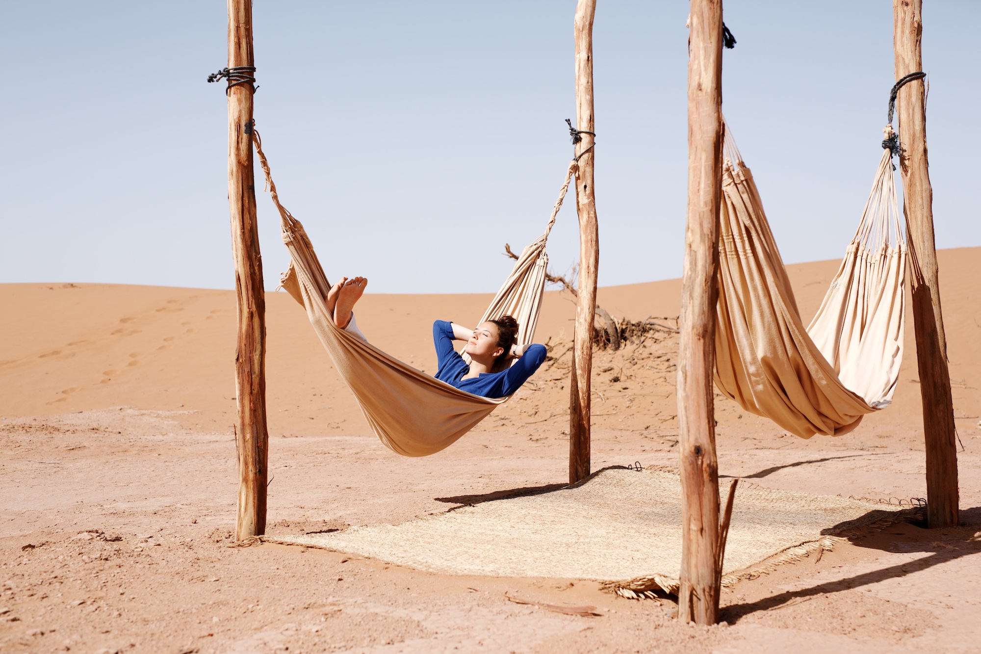 relaxing in the sahara desert during stay with erg chigaga luxury camp